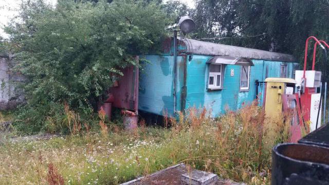 Комплекс зданий и сооружений автобазы общей пл. 1555 кв.м. с асфальтобетон. площадкой 0,8 га (г.Глубокое, ул. Железнодорожная, 1)