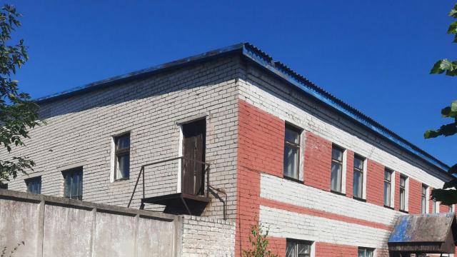 Комплекс зданий и сооружений автобазы общей пл. 1555 кв.м. с асфальтобетон. площадкой 0,8 га (г.Глубокое, ул. Железнодорожная, 1)
